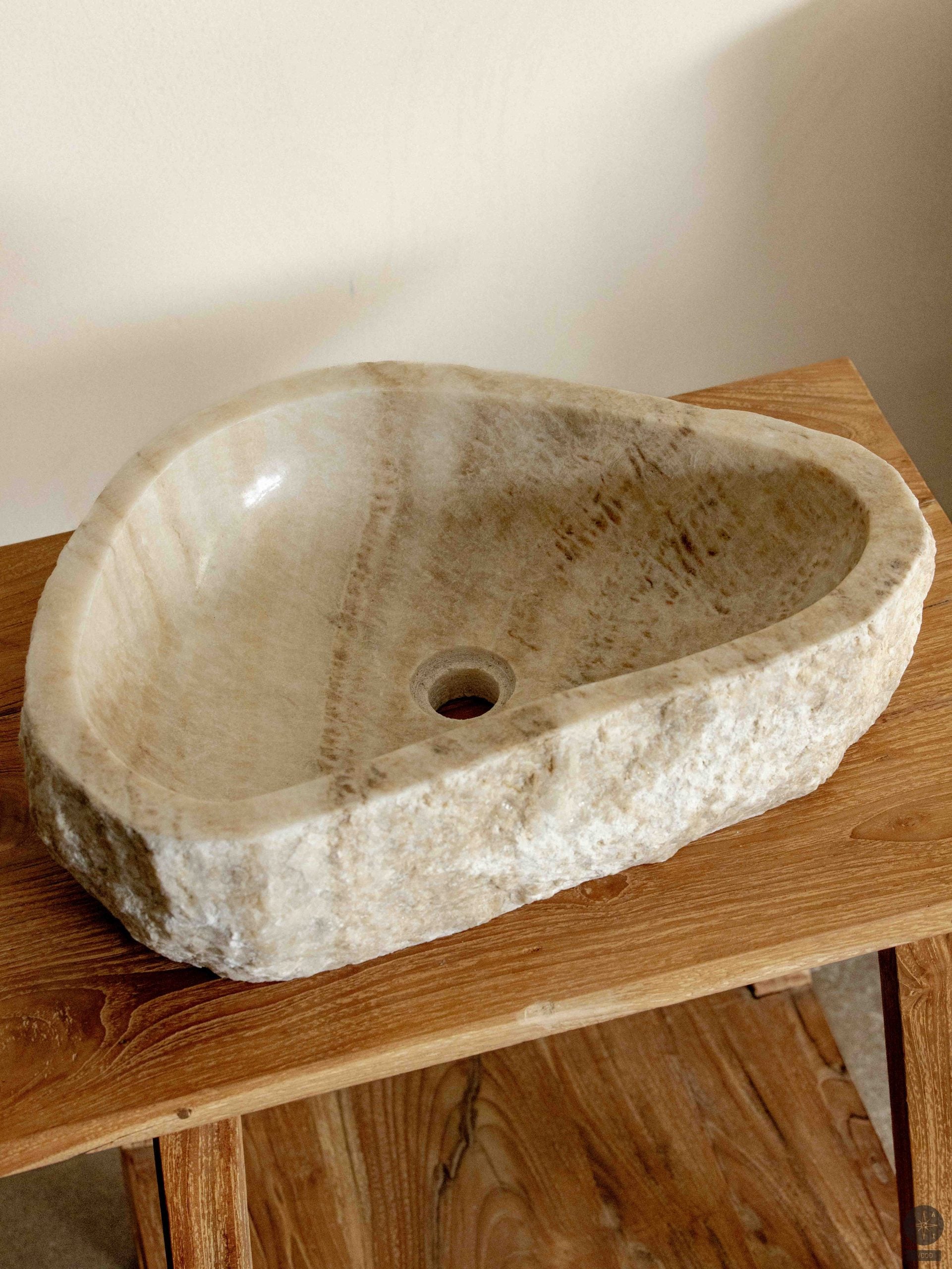 Onikso akmens praustuvas