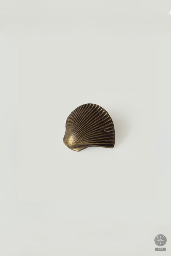 Kriauklės formos rankenėlė